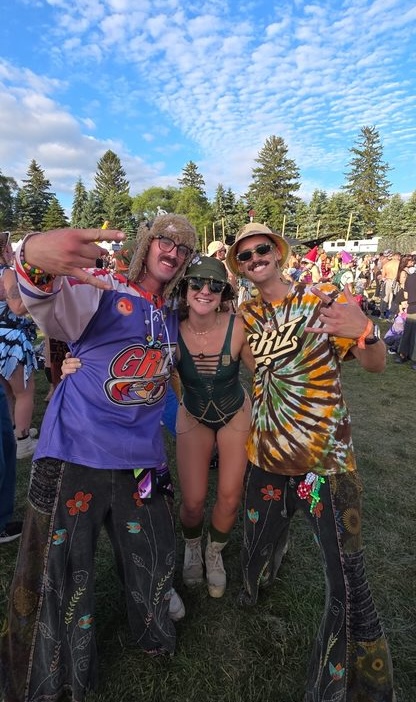 Three friends in Sunstrung shades on the field